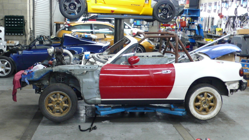 Illustration for article titled Eyesore Racing's Ghettocharged Miata Fears No Turbocharged Peugeot Surrender Monkeys!
